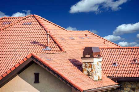 Red tile roof with chimney